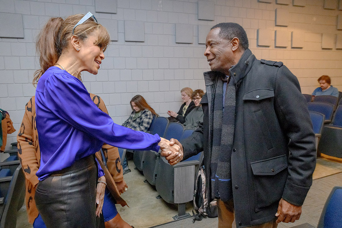 Middle Tennessee State University President Sidney A. McPhee, right, shakes hands with Seattle real estate investor Dana Frank Tuesday, Feb. 18 before she spoke at Keathley University Center Theater on campus in Murfreesboro, Tenn. Frank, author of “Get Up and Get On It: A Black Entrepreneur’s Lessons on Creating Legacy and Wealth,” served as the university’s Black History Month keynote at MTSU and told the crowd to “light a flame and make it bright.” (MTSU photo by J. Intintoli)
