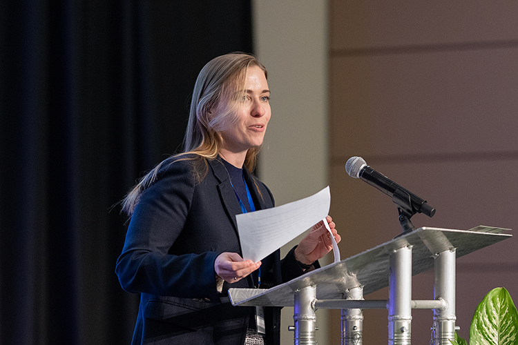 Ashley Valanzola, assistant professor of the Holocaust in the History Department, speaks to attendees at the Middle Tennessee State University Holocaust Studies Conference on March 6 in the Student Union Ballroom on the MTSU campus in Murfreesboro, Tenn. (MTSU photo by Cat Curtis Murphy)