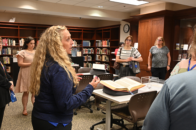 Kathleen Schmand, dean of the James E. Walker Library Middle Tennessee State University, speaks to faculty and staff in the Special Collections room during a library tour on May 20. The tour was a part of the “Get to Know Your MTSU” informational series to inform employees about programs they may be unaware of on the MTSU campus in Murfreesboro, Tenn. (MTSU photo by Jordan Reining)