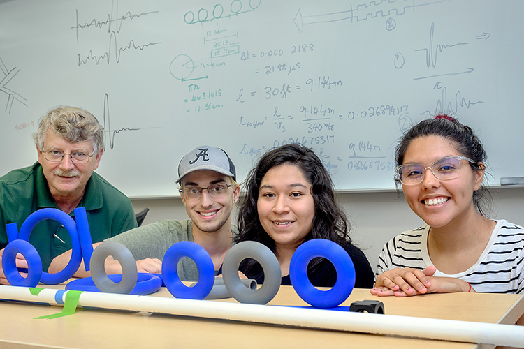 William Robertson, Middle Tennessee State University physics and astronomy professor, far left, worked with undergraduate students from around the country as part of the National Science Foundation Research Experience for Undergraduates grant. Students, kneeling from left, Alex LaVerde, Carina Vazquez and Jennifer Lopez researched acoustic ring resonance in the Wiser-Patten Science building on July 28, 2021. (MTSU photo by J. Intintoli)