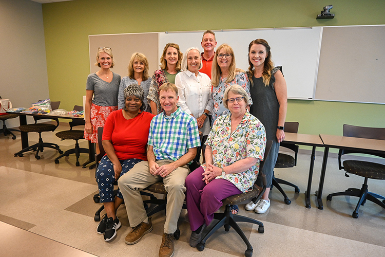 Middle Tennessee State University faculty Jeremy Winters, center front, Dovie Kimmins, far right front, and Katie Schrodt, far right back, partnered with Murfreesboro City Schools on Project Optimal, training an inaugural cohort of MCS teachers in math literacy over the past year and wrapping up the final five of 10 total days at the College of Education this summer. (MTSU photo by Stephanie Barrette)