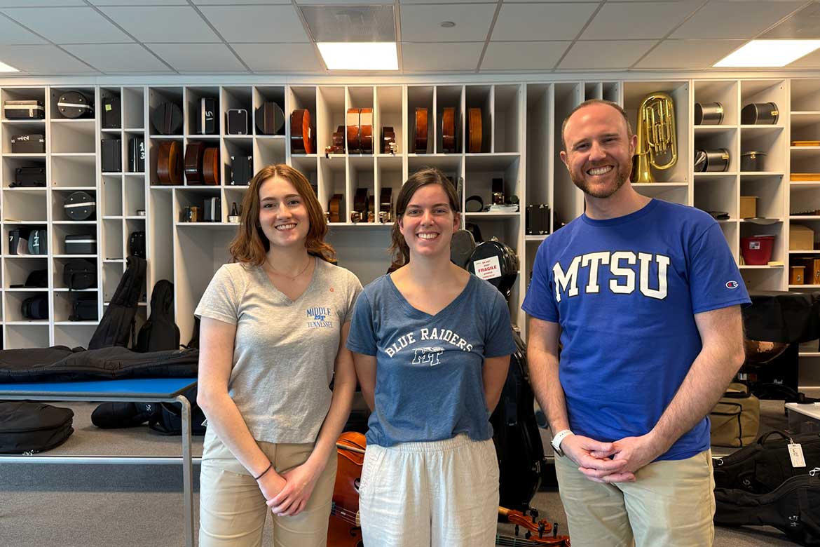 In this February 2025 photo, from left, Middle Tennessee State University School of Music graduate teaching assistant Jayna Powell, senior Annalisa Thomas and assistant professor Bryan Hayslett pose for a photo at the site of a three-day cello workshop they led in George Town, Cayman Islands, for around 30 students ages 5 to 20 thanks to the Florida-based Volta Music Foundation. (Photo submitted)