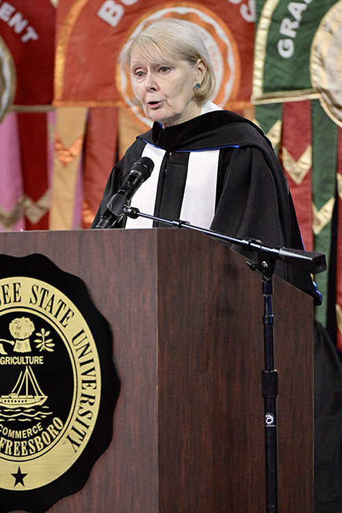 MTSU Board of Trustees Vice Chair Christine Karbowiak speaks to graduates at Middle Tennessee State University Saturday, May 7, during the university's spring 2022 afternoon commencement ceremony in Hale/Earle Arena inside Murphy Center. Karbowiak also is a retired top Bridgestone Americas executive. MTSU awarded 2,474 degrees — 2,041 to undergraduates and 433 to graduate students — during its three-ceremony spring 2022 commencement event. (MTSU photo by Andy Heidt)