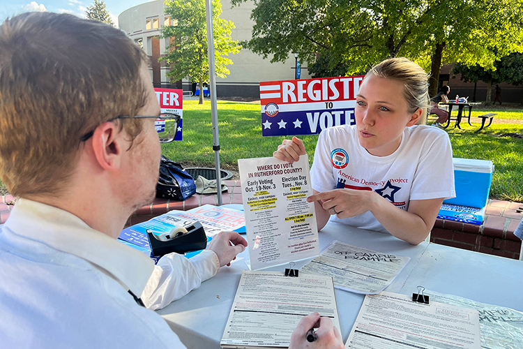 Kayla Jenkins, Middle Tennessee State University graduate student, helps register an MTSU student to vote on Sept. 20, 2022, on campus as part of her work as a public history graduate research assistant and the university’s push to get a record number of MTSU students registered to vote and out to the polls for the November election. Deadline to register to vote in November is Oct. 11. (MTSU photo by Stephanie Barrette)