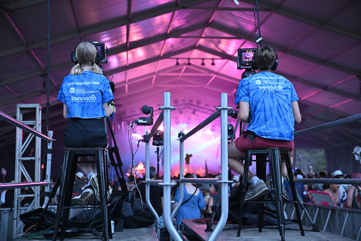 Students from Middle Tennessee State University’s College of Media and Entertainment work the cameras Thursday, June 12, at the 2025 Bonnaroo Music and Arts Festival in Manchester, Tenn. A team of about 50 students gained experience filming concerts, directing livestreams, creating social media content for university channels and writing stories before the four-day festival was cancelled Friday night, June 13, due to rain and additional weather concerns. (MTSU photo by James Cessna)