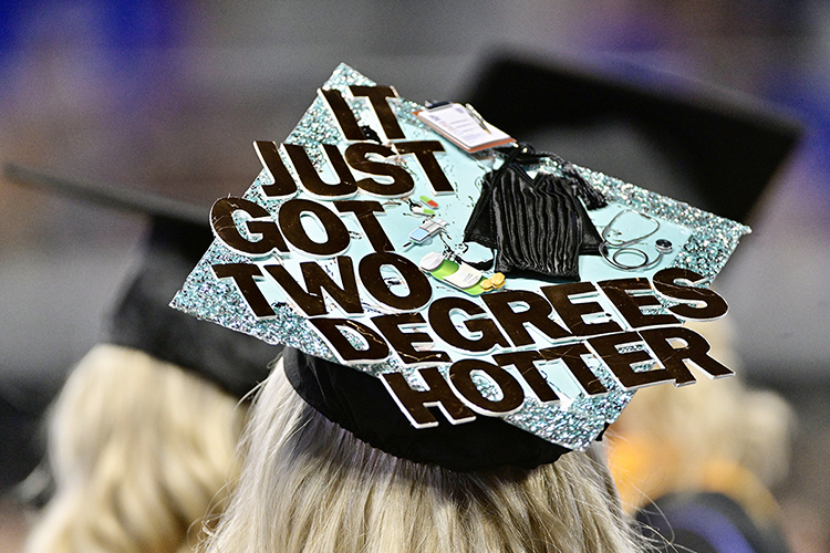 A new MTSU graduate's customized mortarboard celebrates her accomplishment at the university’s summer 2021 commencement ceremony Saturday, Aug. 7, in Murphy Center. MTSU presented degrees to 825 new graduates of the August Class of 2021 at the event. (MTSU photo by Andy Heidt)