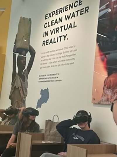 Students with the Siegel Humanities Academy at Siegel High School in Murfreesboro, Tenn., visit the immersive storytelling exhibit at the Experience Lab by Charity: Water in Franklin, Tenn.